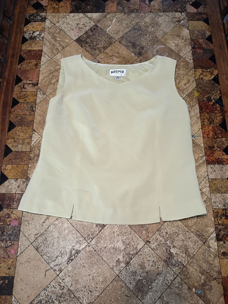 Blouse for medium women. Size is good for the average woman. Price is $245. 